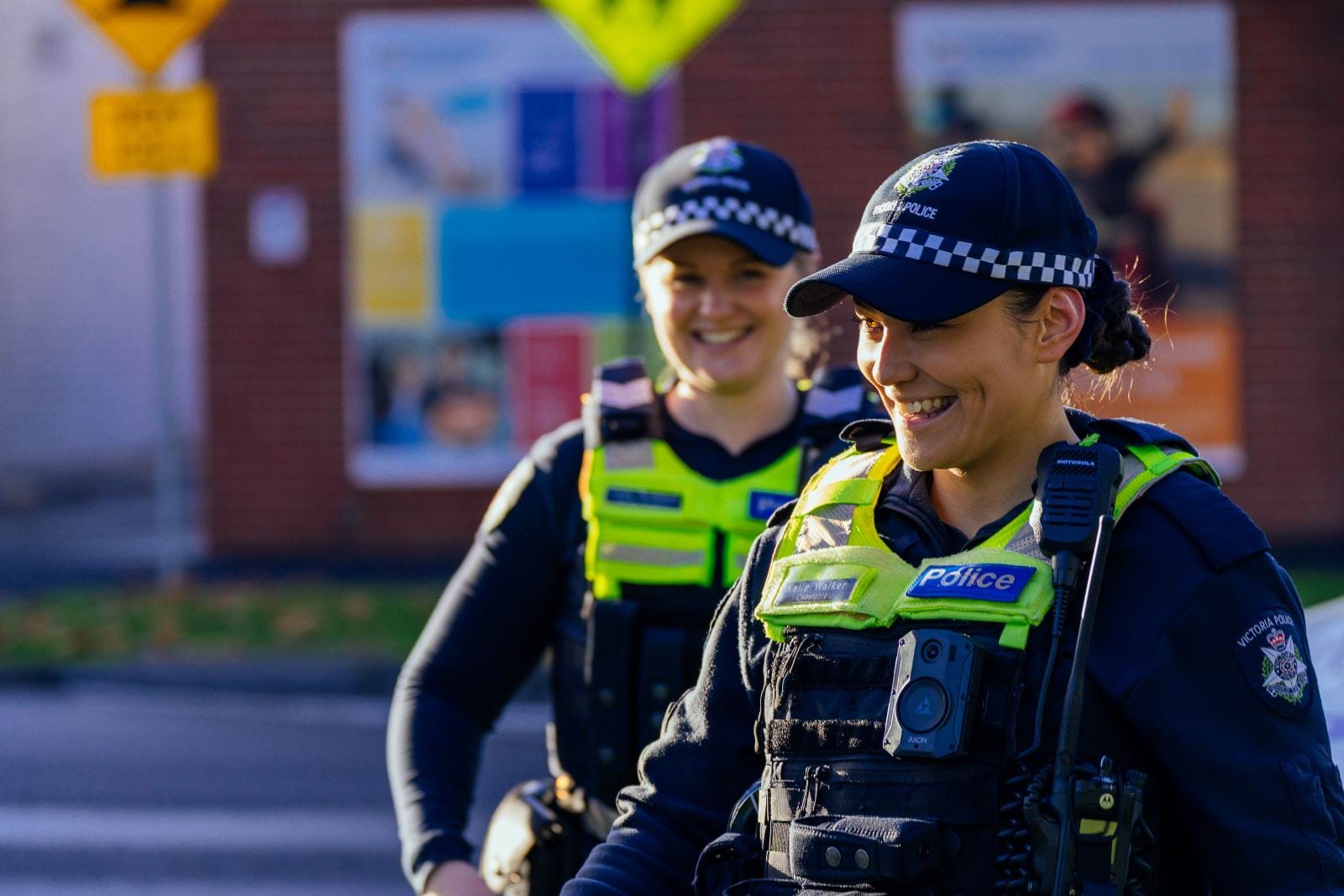 Two smiling Victoria Police officers 