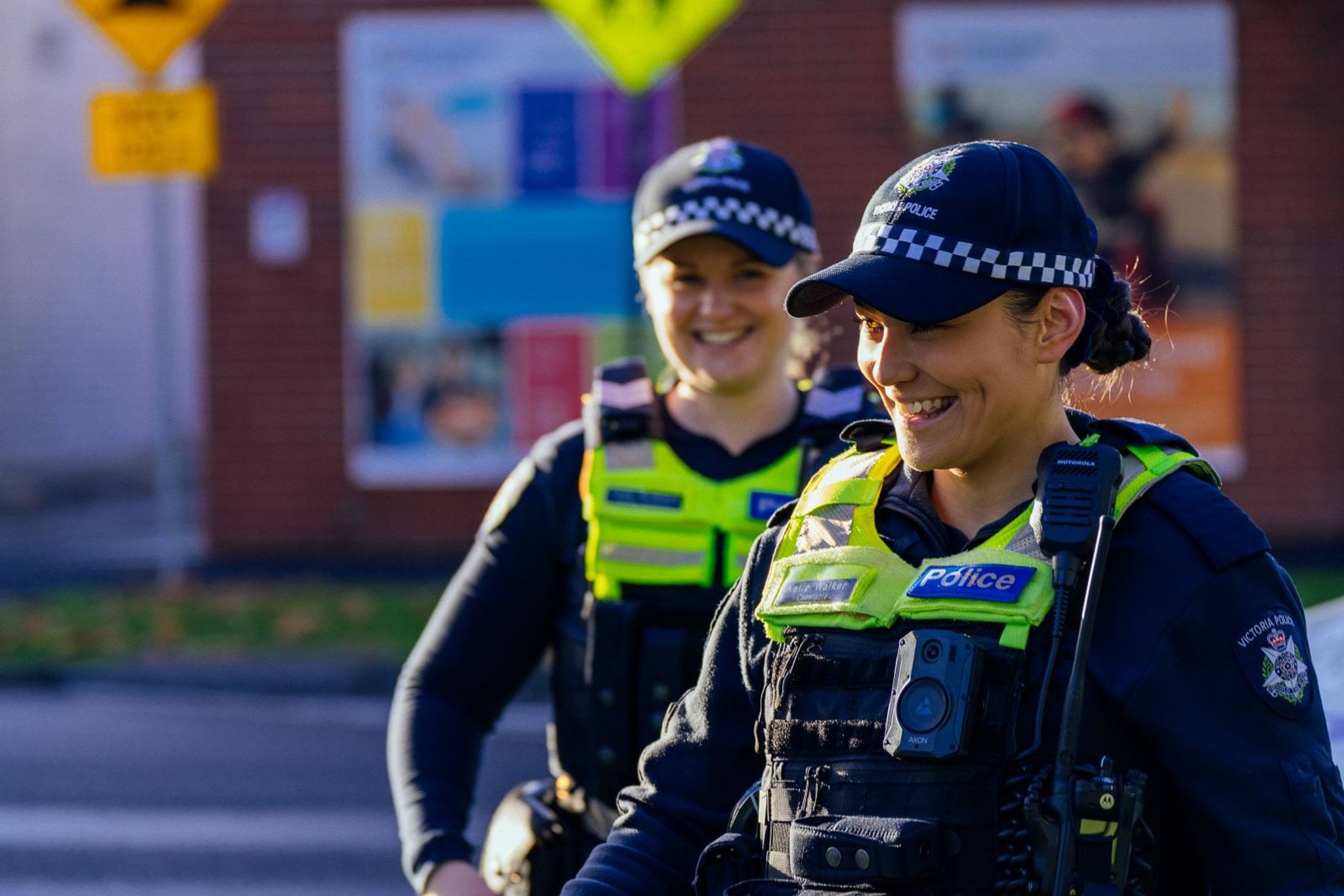 Two smiling Victoria Police officers 