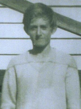 Allan Whyte, wearing a long sleeve white top. He has short brown hair.