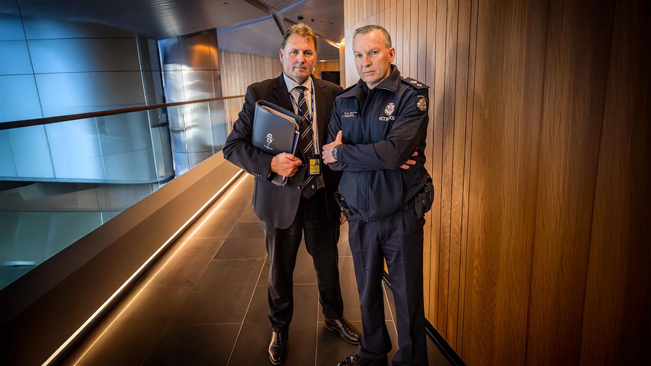 Police life - Two detectives inside an office building
