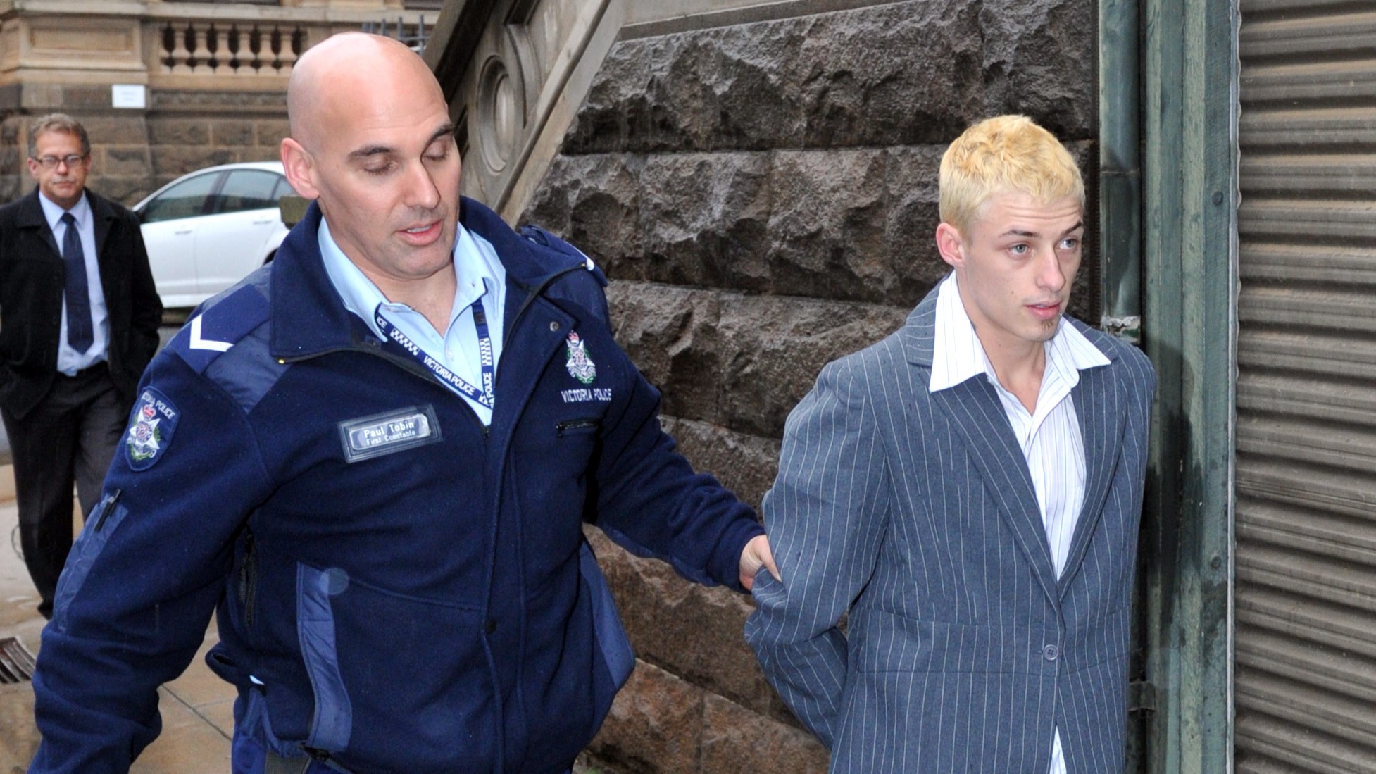 News - Police Life - Can a burglar be a murderer - Police member escorting Harley Hicks - 1280x720 - in-page