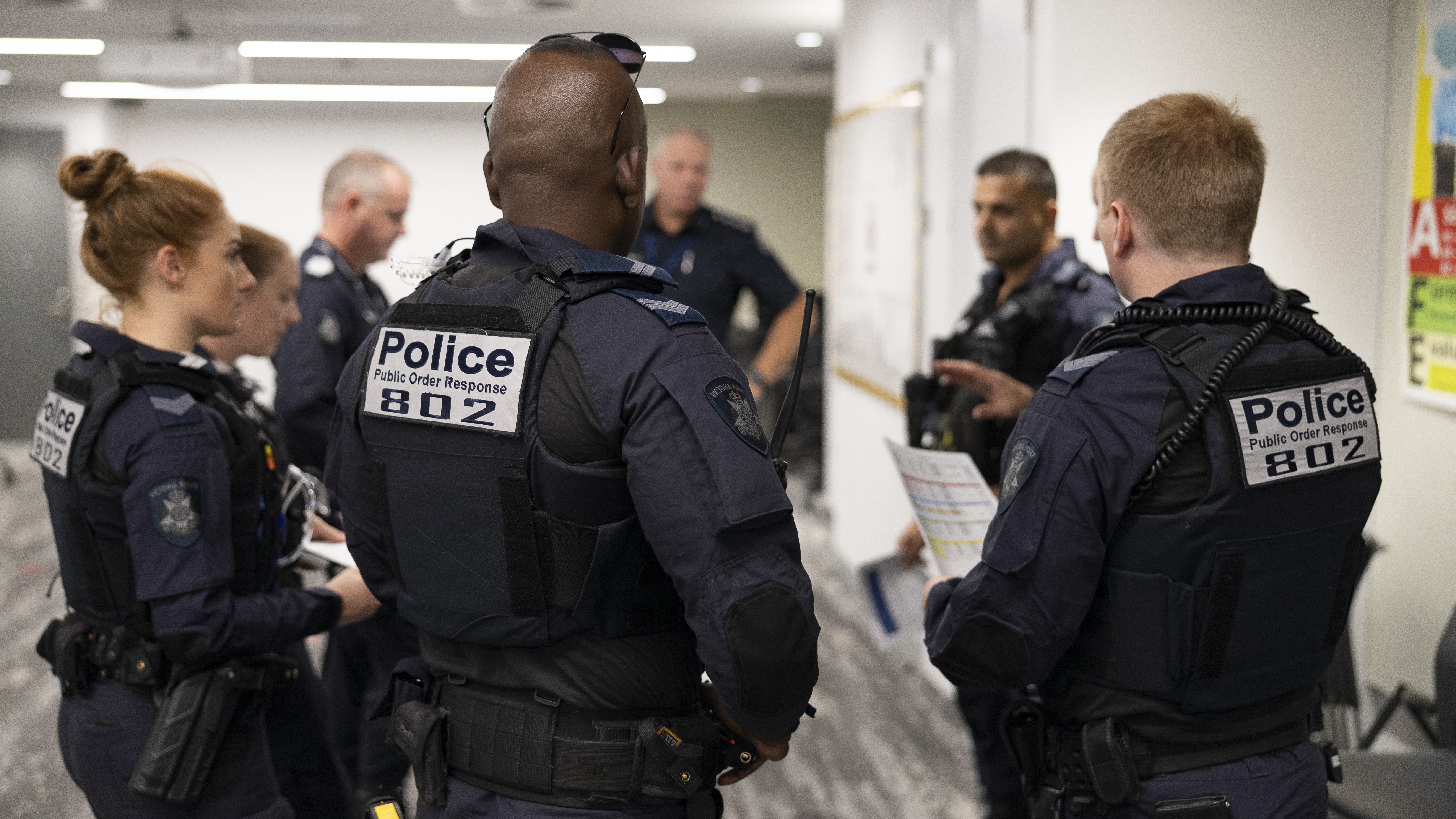 Police Life - A group of Public Order Reponse Team members standing in a circle