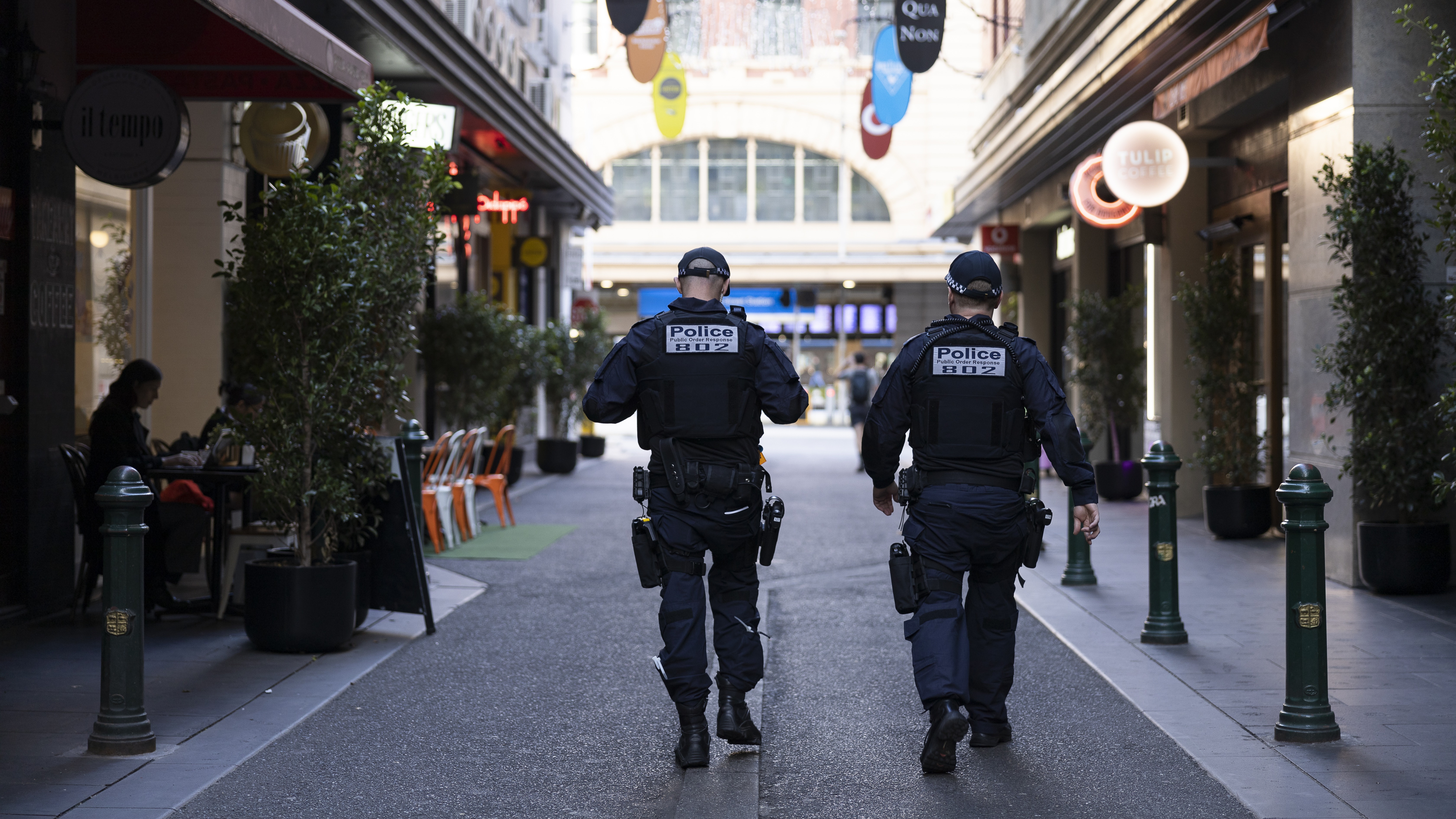 Police Life - Two Public Order Response Team officers walking down a laneway