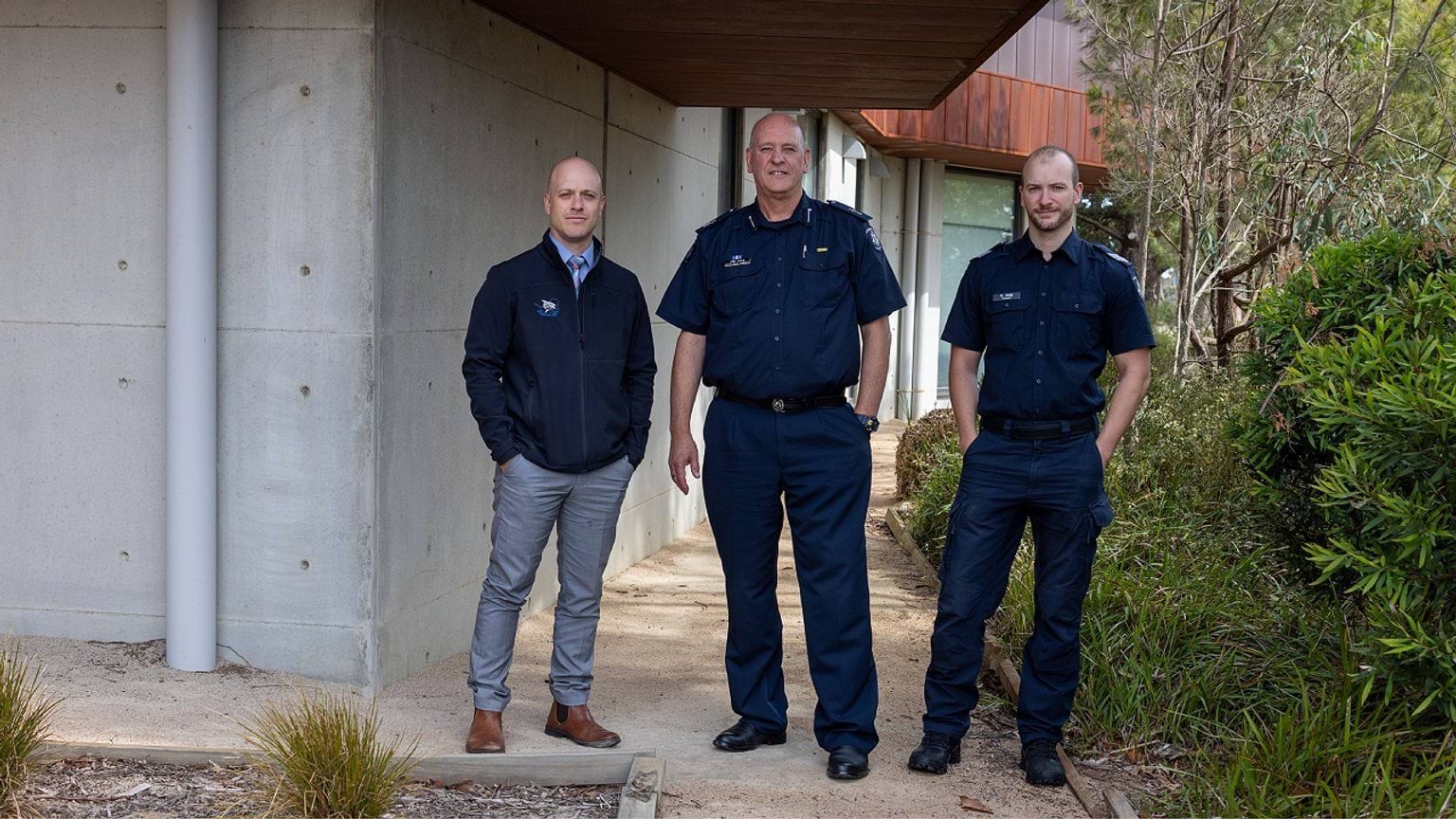 Family faithfully serving the community - three employees standing together