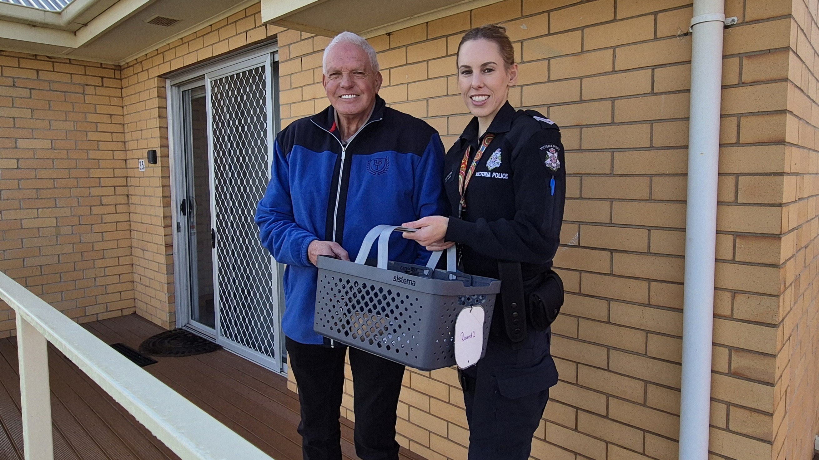 Police member standing with Stawell local