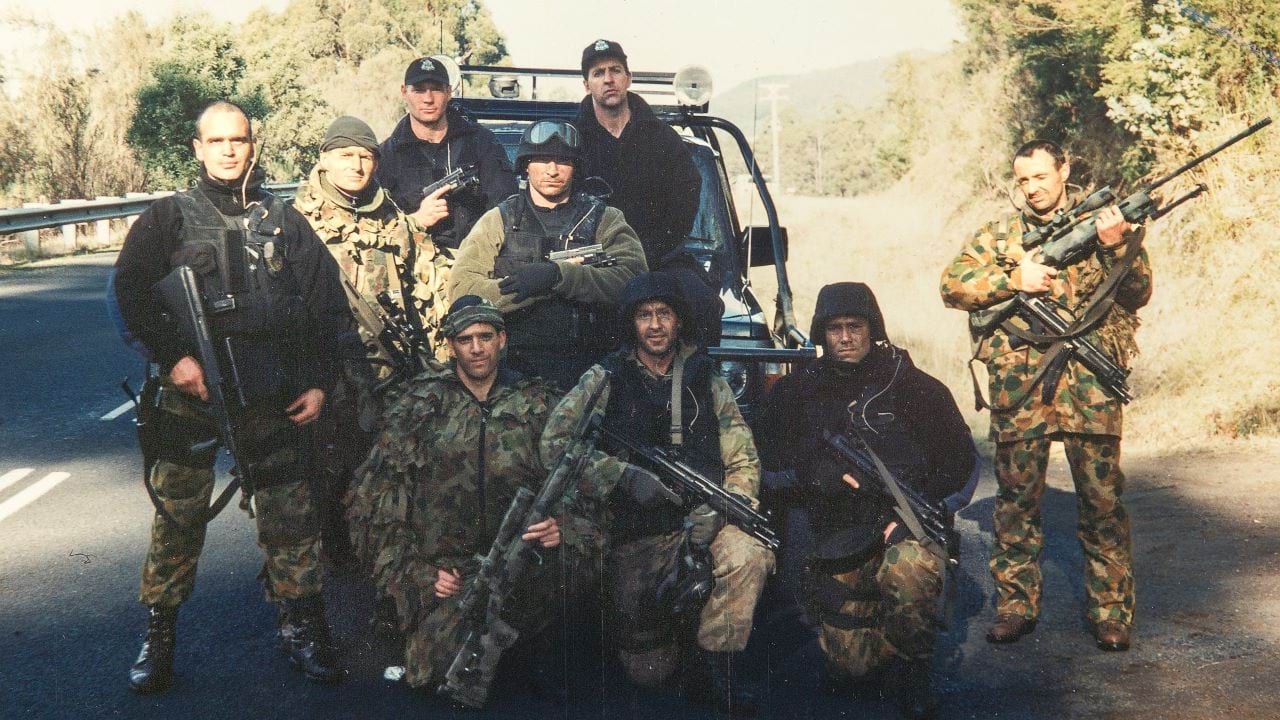Officers from the SOG (Special Operations Group) prepare to enter the unfolding Port Arthur incident. 