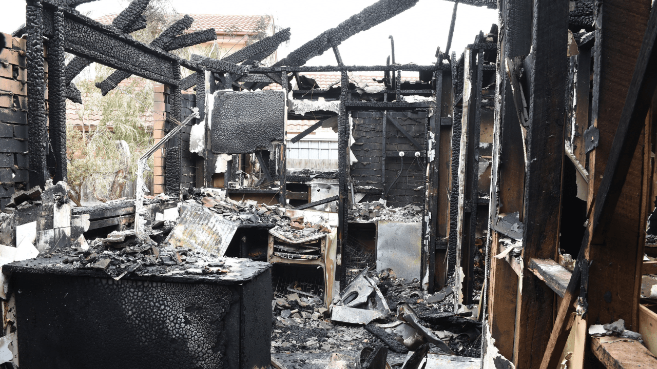 Police Life - the remnants of a kitchen in a home destroyed by fire.