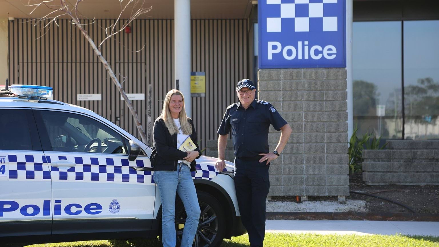 News - Police Life - Ldg Sen Const Smith with Tracie Alborough outside police station.