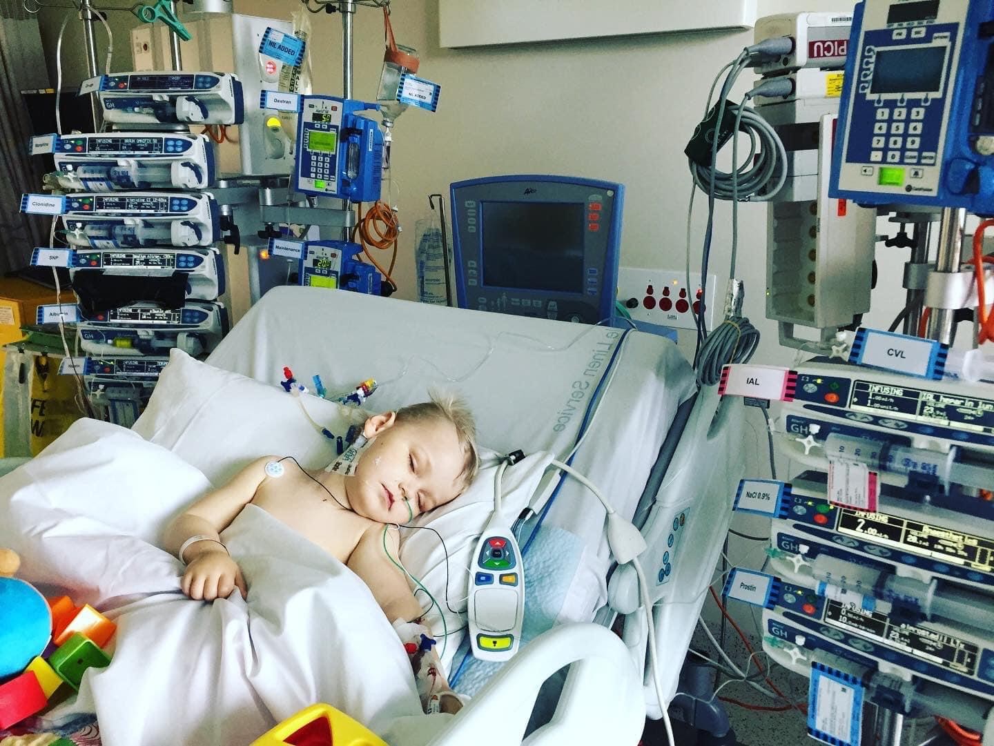 Police Life - Child in hospital bed with monitors attached to them.