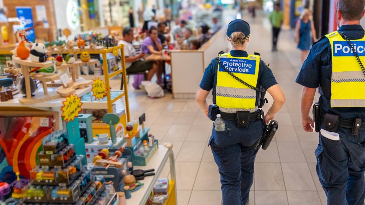 Homepage - two officers inside shopping centre - feature