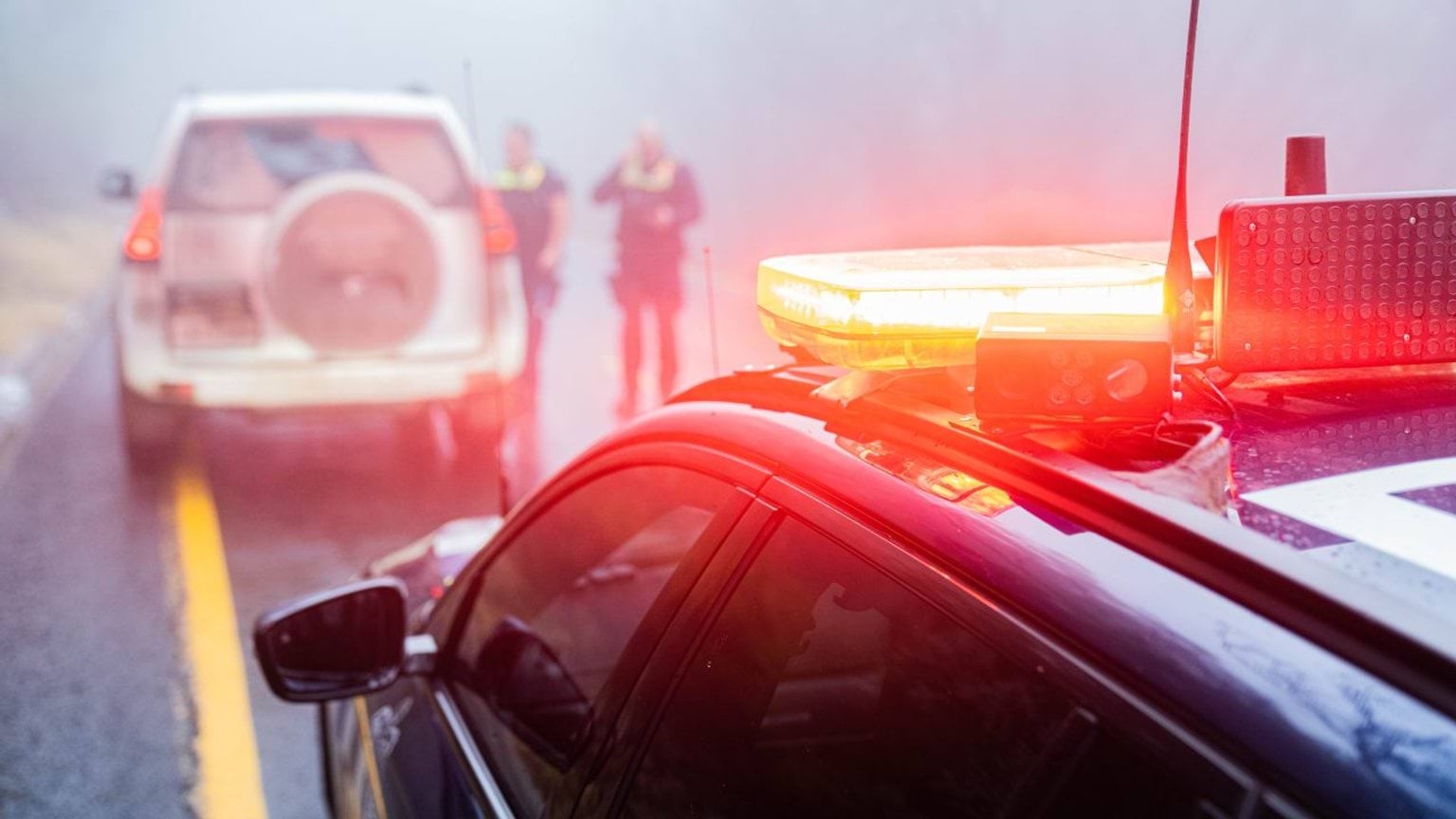 Winter safety officers on winter road