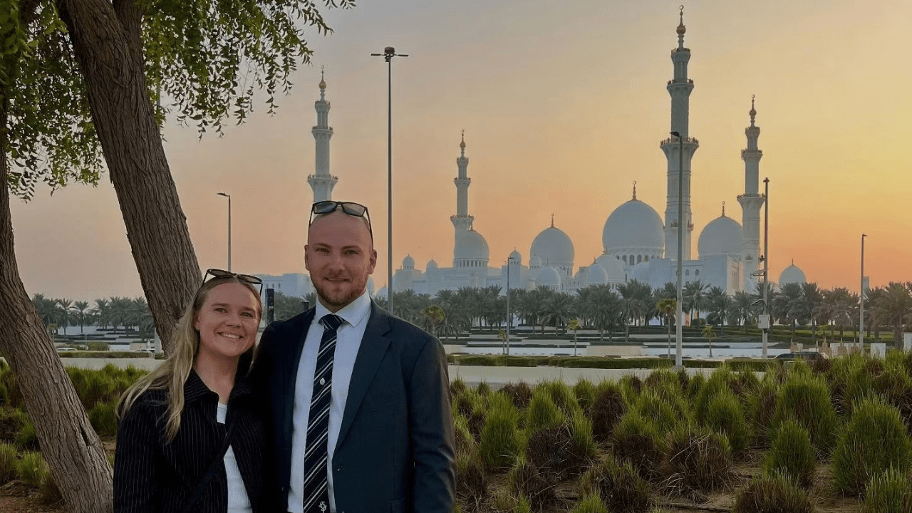 Police Life: Detective senior constables Megan Lewis and Mitch Lording, in civilian clothing, enjoy a sunset in the UAE.