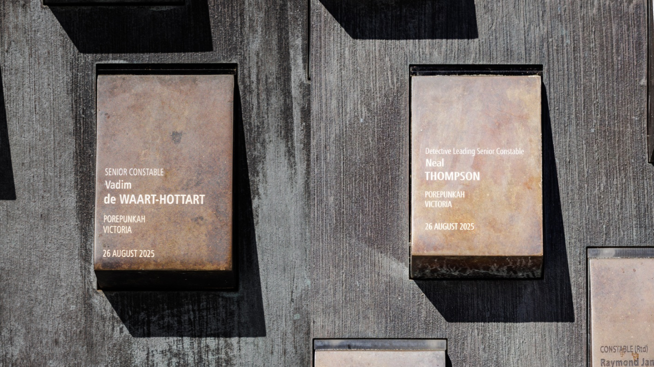 Image of the two touchstones with Neal and Vadim's names on the national wall.