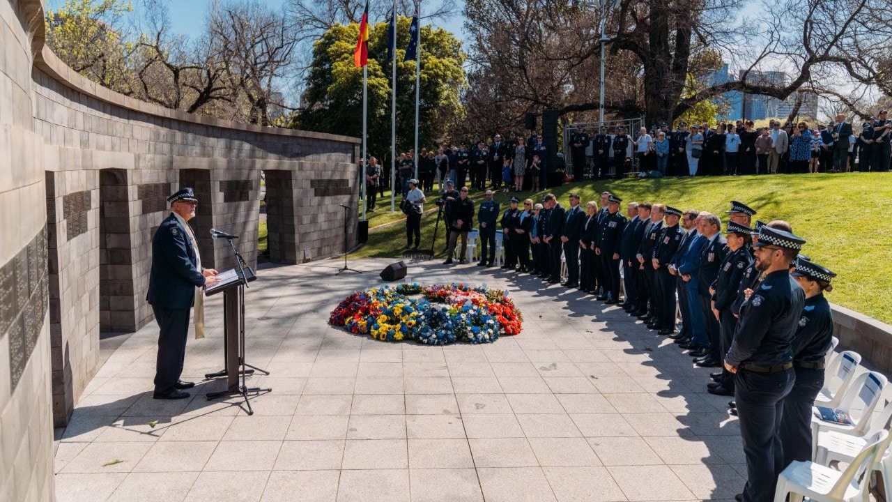 Deputy Commissioner Bob Hill addressing officers and members of the public at the Victoria Police Memorial.